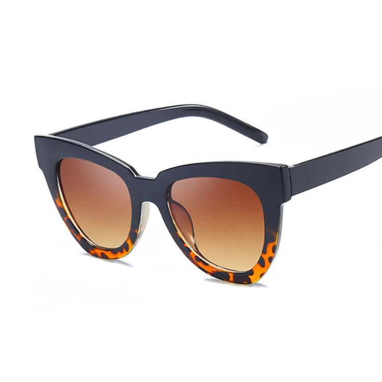 Lunettes de soleil carrées en œil de chat pour femmes, monture noire.